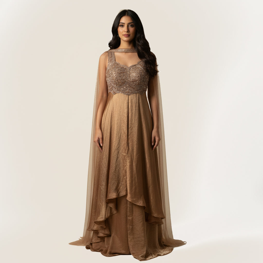 This elegant outfit comes in a soft golden tone with a shimmer finish. The kurta features fine hand embroidery on the bodice with beads and sequins that add a rich sparkle.

The front-cut design gives it a stylish and modern look. The matching palazzo adds flow and comfort, making the outfit graceful and easy to carry.


A sheer dupatta completes the look, making it perfect for festive occasions, weddings, evening part