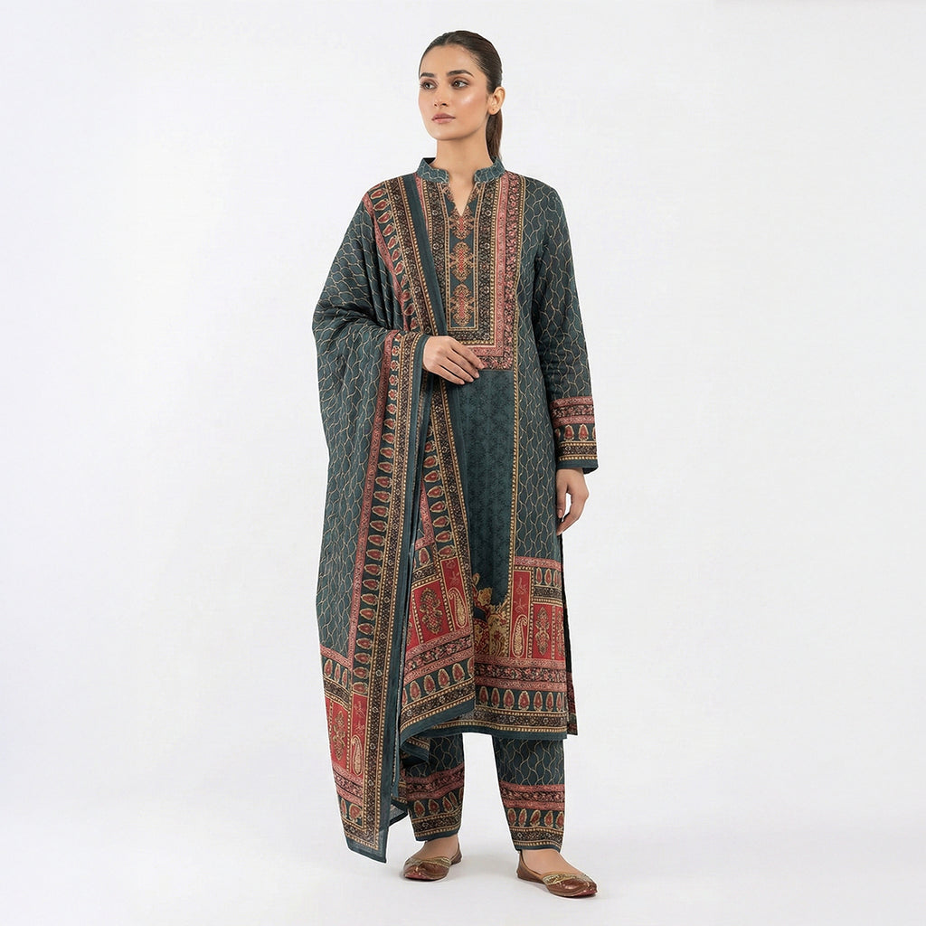 This traditional outfit is in a smart dark grey color. The kurta features a unique wavy line pattern all over and a detailed design on the neck in red and beige colors. It comes with matching pants and a beautiful shawl (dupatta) that has a rich, printed border. This outfit is elegant, comfortable, and perfect for office wear or casual winter days.