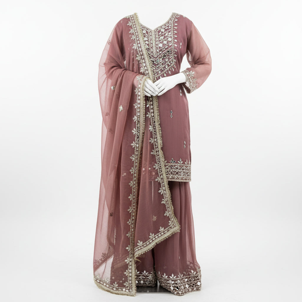 This beautiful outfit comes in a soft mauve color with pretty silver embroidery.&nbsp;The kurta has fine work around the neck and sleeves that adds a gentle shine.

The matching palazzo have lovely embroidery at the bottom, giving the outfit an elegant look.

A light dupatta with delicate work and a neat border completes the set, making it perfect for festive events, weddings and special occasions.