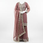 This beautiful outfit comes in a soft mauve color with pretty silver embroidery.&nbsp;The kurta has fine work around the neck and sleeves that adds a gentle shine.

The matching palazzo have lovely embroidery at the bottom, giving the outfit an elegant look.

A light dupatta with delicate work and a neat border completes the set, making it perfect for festive events, weddings and special occasions.