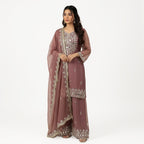 This beautiful outfit comes in a soft mauve color with pretty silver embroidery.&nbsp;The kurta has fine work around the neck and sleeves that adds a gentle shine.

The matching palazzo have lovely embroidery at the bottom, giving the outfit an elegant look.

A light dupatta with delicate work and a neat border completes the set, making it perfect for festive events, weddings and special occasions.