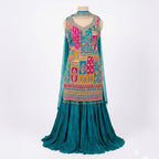 This vibrant outfit is in a rich teal color. The kurta has beautiful multicolored embroidery with detailed patterns and mirror work, giving it a festive look. It comes with a flowy, pleated palazoo and a matching dupatta.

This outfit is bright, elegant, and perfect for weddings, mehndi functions, and festive celebrations.