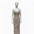 This is an elegant two-piece white color Indo-Western ensemble.

The outfit features a structured, intricately embroidered corset-style bustier top paired with a long, gracefully draped skirt.

This contemporary and chic set is suitable for formal events, cocktail parties, and festive occasions