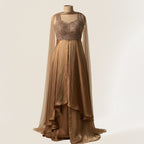 This elegant outfit comes in a soft golden tone with a shimmer finish. The kurta features fine hand embroidery on the bodice with beads and sequins that add a rich sparkle.

The front-cut design gives it a stylish and modern look. The matching palazzo adds flow and comfort, making the outfit graceful and easy to carry.


A sheer dupatta completes the look, making it perfect for festive occasions, weddings, evening part