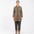 This trendy outfit is full of colors. The top is a shirt-style kurta with a smart collar and buttons down the front. It features a rich, detailed print with teal, beige, and red patterns. It comes with contrasting black pants that have a cute, small geometric design. This outfit is smart, unique, and perfect for casual wear or office days.