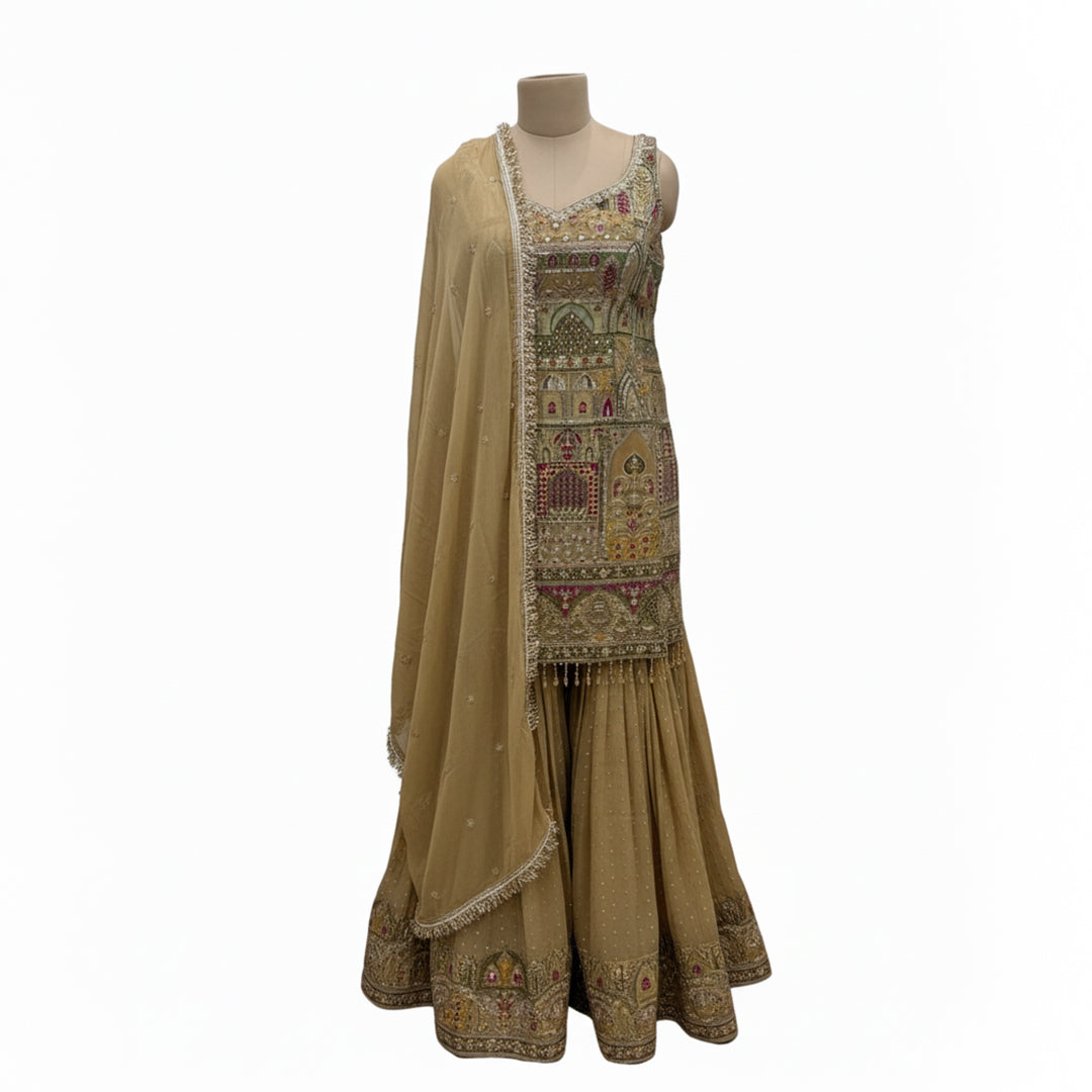 This beautiful outfit comes in a soft mauve color with pretty silver embroidery. The shirt has fine work around the neck and sleeves that adds a gentle shine.

The matching palazzo pants have lovely embroidery at the bottom, giving the outfit an elegant look.

A light dupatta with delicate work and a neat border completes the set, making it perfect for festive events or special occasions.